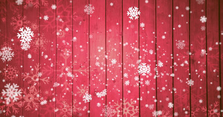 Image of snow falling on red wooden background with copy space at christmas. Christmas, tradition and celebration concept digitally generated image.の写真素材