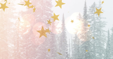 Image of gold christmas stars falling over sunlit trees in winter landscape. Christmas, winter, festivity, tradition and celebration concept digitally generated image.の写真素材