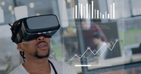 Image of data processing over african american businessman using vr headset. Global artificial...