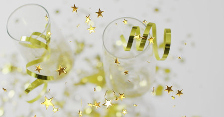 Image of starsi, party streamers and champagne glasses. New year's eve, christmas, festivity,...