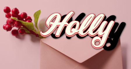Image of holly text banner over red cherries and envelope on pink surface. Christmas festivity and celebration conceptの写真素材