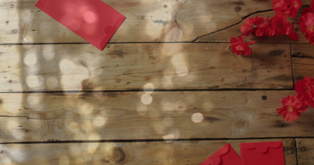 Image of chinese traditional decorations with glowing light spots. Chinese new year, festivity, celebration and tradition concept digitally generated image.の写真素材