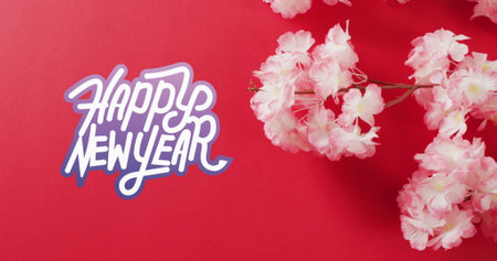 Image of new year greetings text over chinese blossom on red background. Chinese new year, festivity, celebration and tradition concept digitally generated image.の写真素材