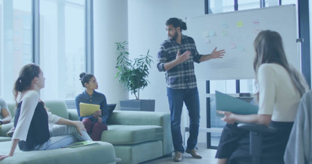 Image of business presentation and diverse team in modern office. teamwork, diversity, technology,...