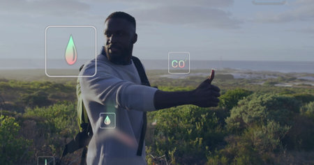 Hiking in nature, man interacting with environmental data image. Outdoors, adventure, technology,...
