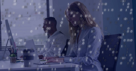 Image of binary coding data processing over diverse business people in office. Global finance, business, connections, computing and data processing concept digitally generated image.の写真素材