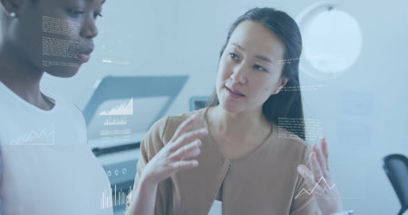 Business data analytics image over diverse professionals discussing in office. teamwork,...
