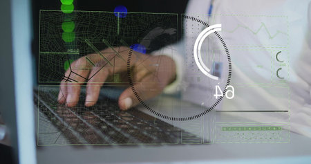 Image of financial data processing over african american man using laptop. Global finance, business,...