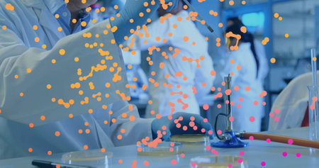 Image of network of connections over caucasian male scientist in laboratory. Global science, connections, computing and data processing concept digitally generated image.の写真素材