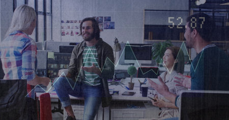 Image of financial data processing over diverse colleagues having meeting in office. Global...