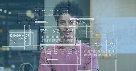 Image of financial data processing over biracial businessman in office. Global finance, business, connections, computing and data processing concept digitally generated image.の写真素材
