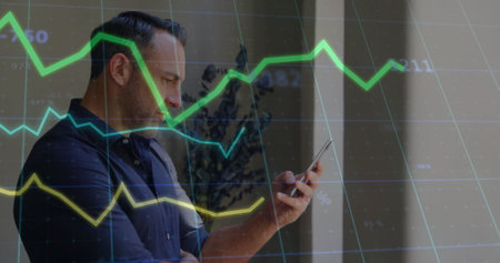 Image of data processing and diagrams over caucasian man using smartphone. Global business,...