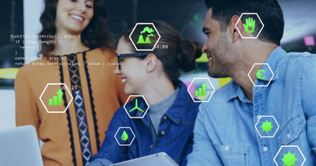 Image of ecology icons and data processing over diverse colleagues discussing work in office. Global business, ecology, computing and digital interface concept digitally generated image.の写真素材