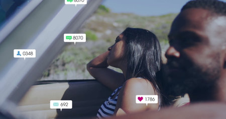 Social media notifications image over people driving in car. Technology, travel, communication,...