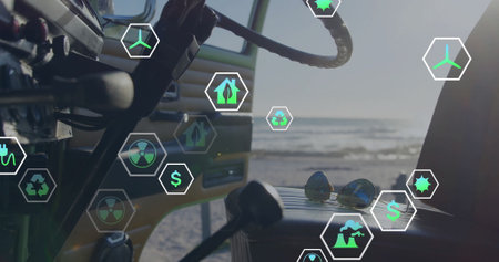 Eco-friendly technology icons image over car interior near beach. Sustainability, innovation, green, future, environment, vehicleの写真素材