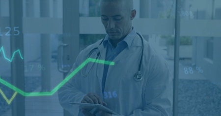 Doctor using tablet with financial data image over hospital background. Healthcare, technology,...