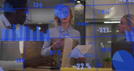 Image of financial data processing over diverse business people in office. Global finance, business,...