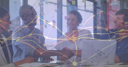 Image of netowork of connections over diverse business people in office. Global finance, business, connections, computing and data processing concept digitally generated image.の写真素材