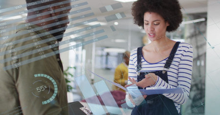 Image of data processing and diagrams over diverse colleagues talking in office. Global business and...