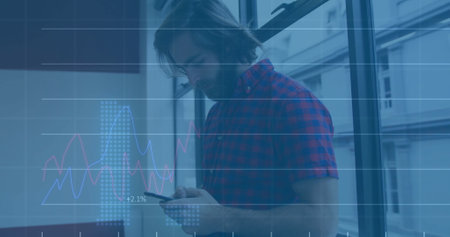 Image of data processing and diagrams over caucasian man using smartphone. Technology, business and...