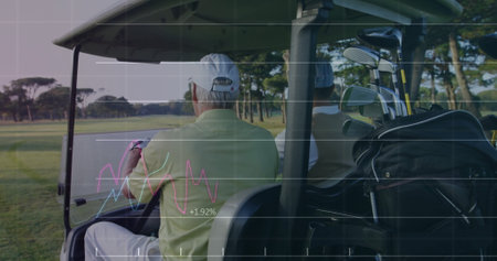 Image of digital data processing over caucasian golf players in caddy on golf course. Global sports, connections, computing and data processing concept digitally generated image.の写真素材