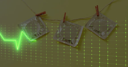 Image of cardiograph over protectives on yellow background. Global science, medicine, computing and...