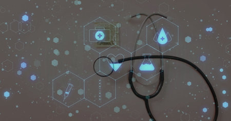 Image of medical icons over stethoscope on white background. Global science, medicine, computing and digital interface concept digitally generated image.の写真素材