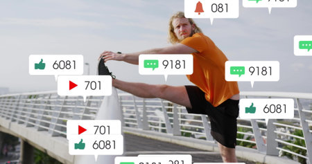 Stretching leg on railing, man surrounded by social media notifications image. Fitness, exercise, wellness, digital, concept, technologyの写真素材