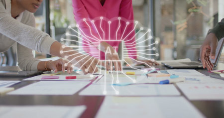 Image of financial data processing over diverse business people in office. Global finance, business, connections, computing and data processing concept digitally generated image.の写真素材