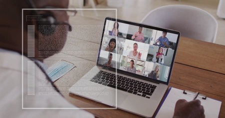 Image of data processing and diagram over diverse colleagues having video call in office. Global business and digital interface concept digitally generated image.の写真素材