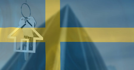 Image of silver house key over waving flag of sweden and office building. Home, house ownership, property and business concept digitally generated image.の写真素材
