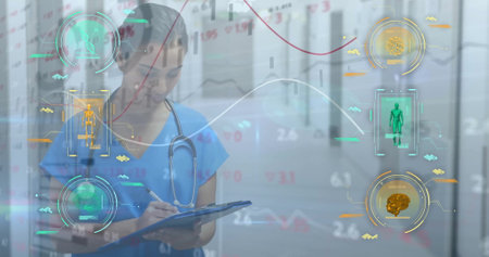 Image of scanners and charts processing medical data over biracial female doctor writing notes....