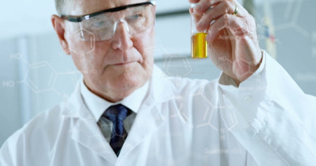 Image of data processing and chemical formula over caucasian male scientist doing experiment. Science and digital interface concept digitally generated image.の写真素材