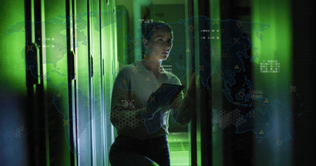 Image of data processing over caucasian female it technician with tablet over computer servers....