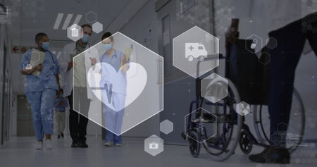 Image of heartbeat and medical icons over diverse doctors in face masks talking in corridor. Medical...