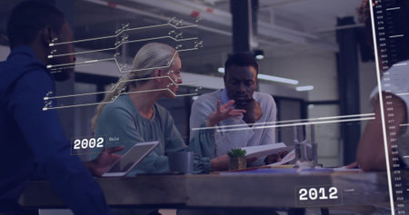 Image of data processing over diverse business people talking. Global business, technology and...