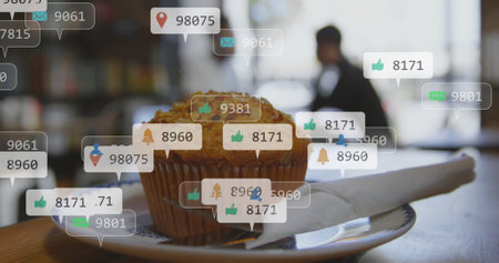 Social media notifications image over muffin on plate in cafe. dessert, smartphone, technology,...