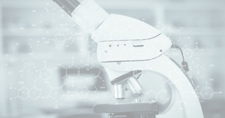 Microscope with chemical formula image overlay in scientific laboratory. Science, research,...