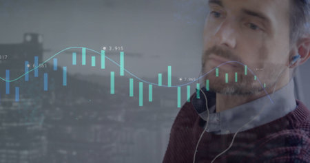 Image of businessman analyzing stock market data on screen, wearing earphones in office. finance,...