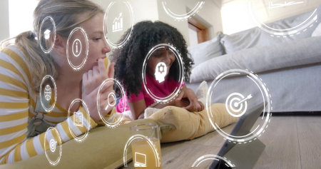 Watching tablet, two women with digital technology icons image over them. communication,...