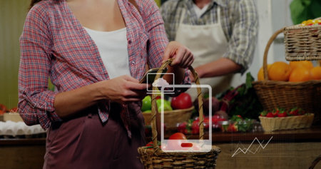 Shopping for groceries, woman holding basket and scanning product, data analysis image. Grocery, technology, supermarket, digital, analytics, customerの写真素材