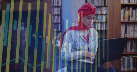 Image of diagrams over biracial female student using laptop. Technology, education and digital...