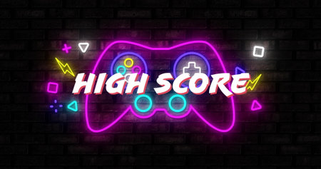 Image of high score text over colourful neon gamepad. Social media, technology and digital interface concept digitally generated image.の写真素材