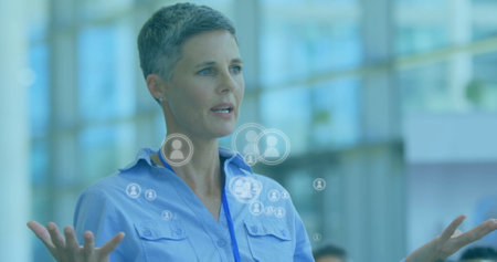Image of people icons over caucasian businesswoman talking. Global finance, business, networking,...