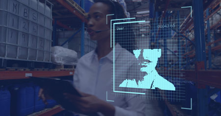 Image of biometric photos and data over biracial businesswoman working in warehouse. Global...