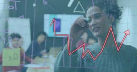 Image of arrow and diagrams over diverse colleagues discussing work in office. Global security, technology and digital interface concept digitally generated image.の写真素材