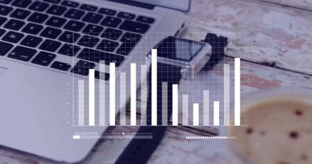 Image of digital data processing over smartwatch and laptop. Global finance, business, connections, computing and data processing concept digitally generated image.の写真素材