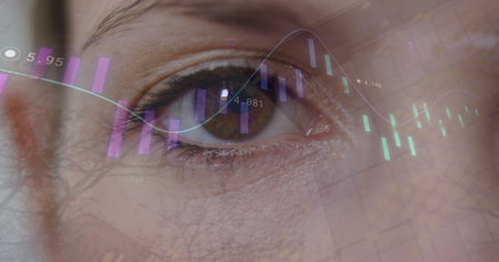 Image of graph and data processing blinking brown eye of caucasian woman. Health, technology, lifestyle, biometrics, digital interface, connection and communication, digitally generated image.の写真素材