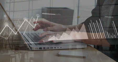 Image of financial data processing over caucasian businesswoman using laptop in office. Global...