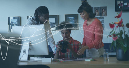 Image of diagram over diverse colleagues talking in office. Business and digital interface concept...